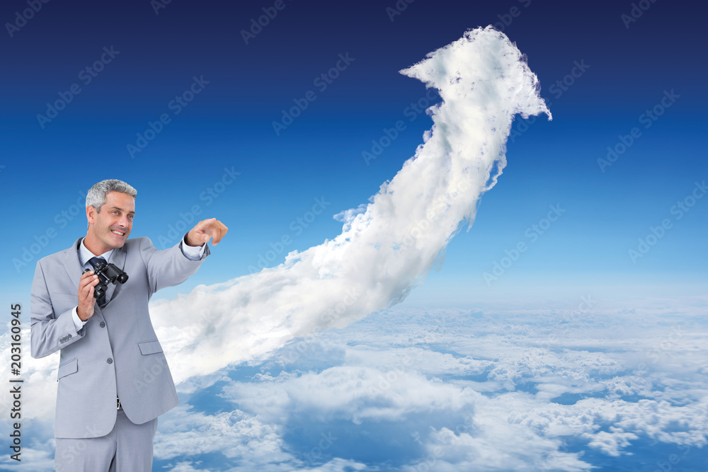Businessman holding binoculars and pointing out something against cloud arrow Businessman holding binoculars and pointing out something against cloud arrow