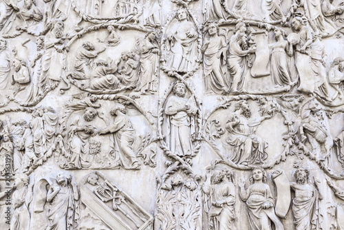 Detail of the facade of the Duomo of Orvieto, Italy. Marble bas-relief representing episodes of the bible © Stefania