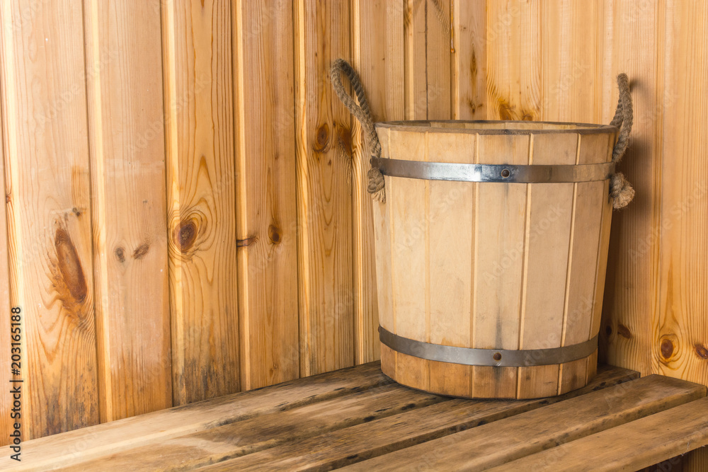 Wooden bucket for water in the bath Wooden bucket for water in the bath