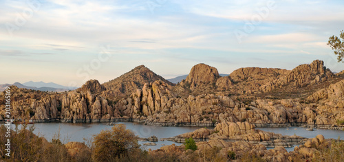 Beautiful spring skies and a rocky shoreline at Watson Lake in Prescott, Arizona