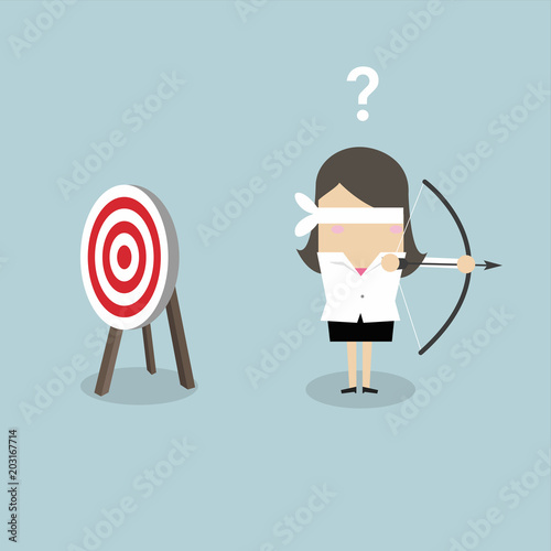 Blindfold businesswoman holding bow and arrow look for target in wrong direction.