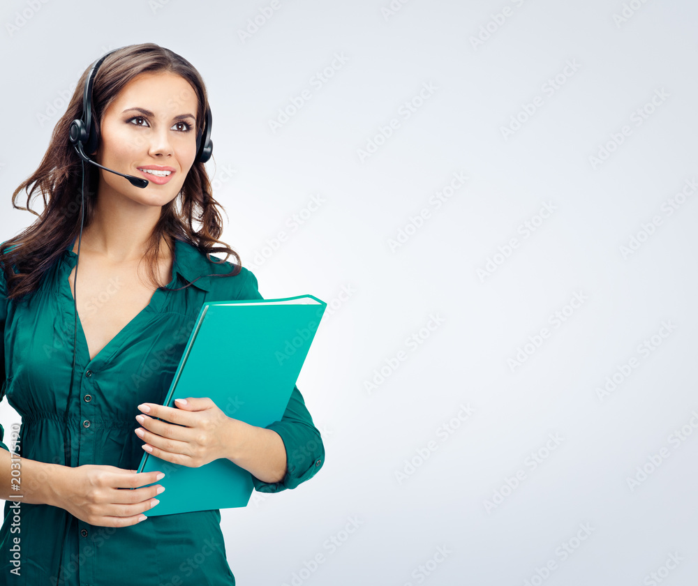 Support phone operator in headset, on grey Support phone operator in headset, on grey