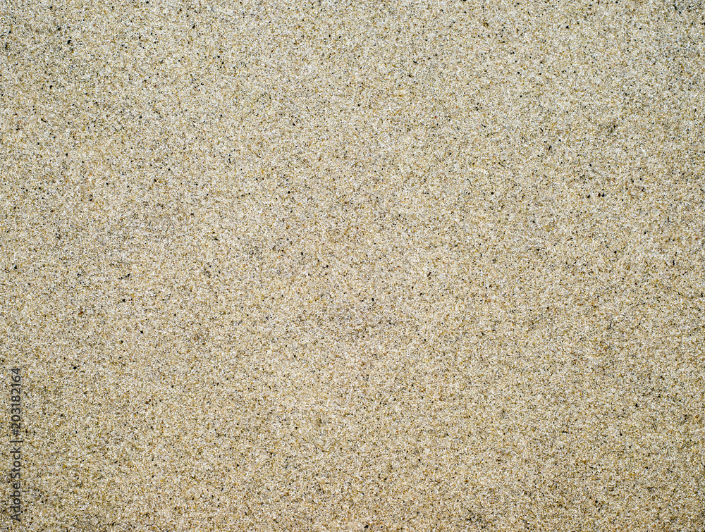 Textured smooth surface of sand. Background. Black and white image. Textured smooth surface of sand. Background. Black and white image.