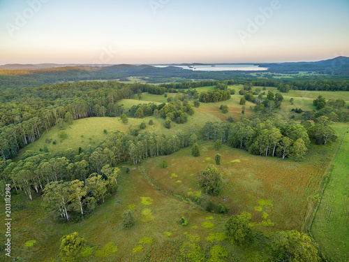Aerial view of rural area and Myall Lake at sunset. Topi Topi, New South Wales, Australia