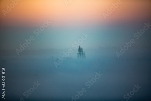 Photography View towards Kalvebod Faelled, the airport and Amager from Oerestad early in the morning