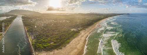 Beautiful aerial landscape of ocean coastline at sunset in Australia