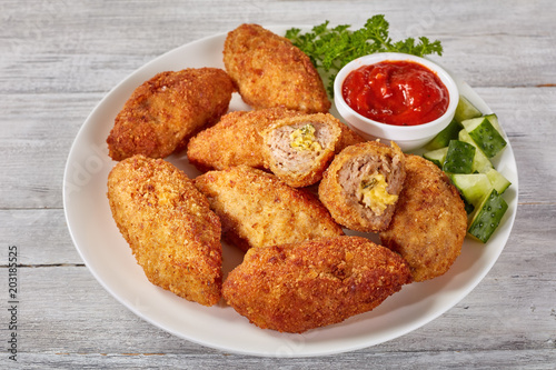meat croquettes on a white plate