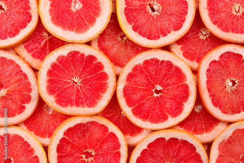 Grapefruit slices background.top view