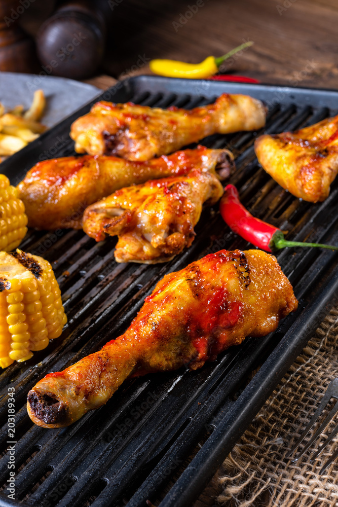 Rustic Grilled chicken wings,legs,and spicy corn