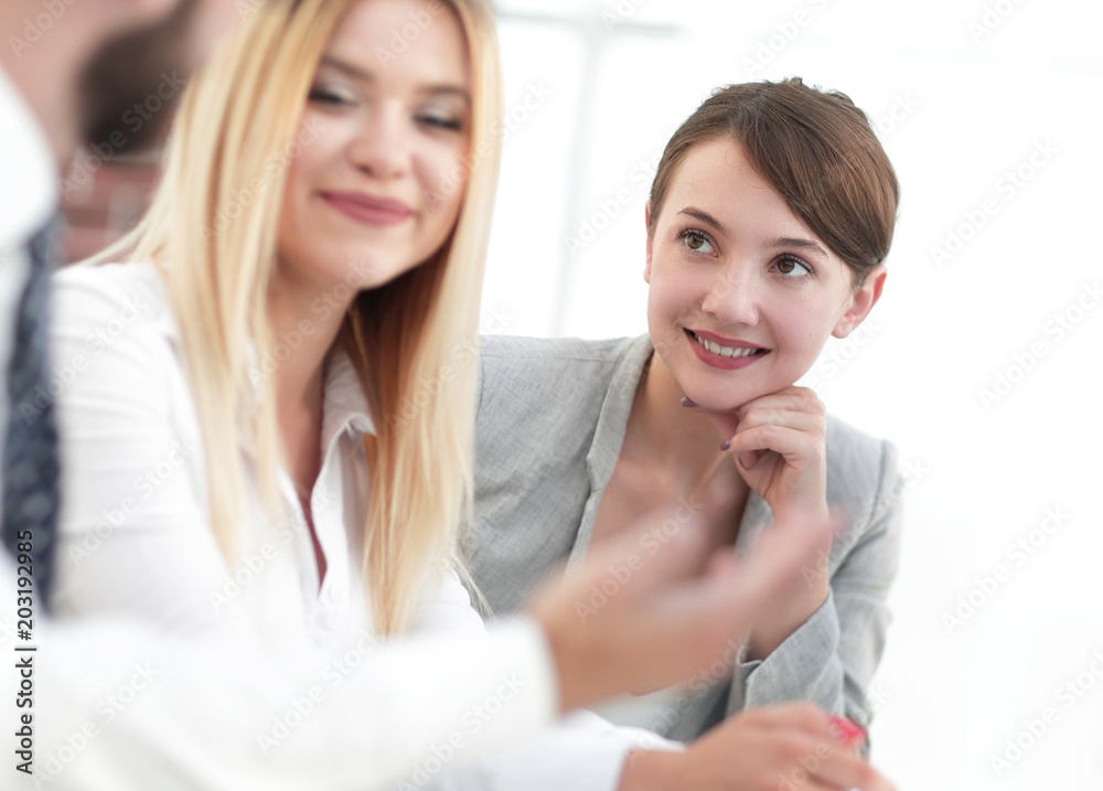 background image of a business team at a Desk. background image of a business team at a Desk.
