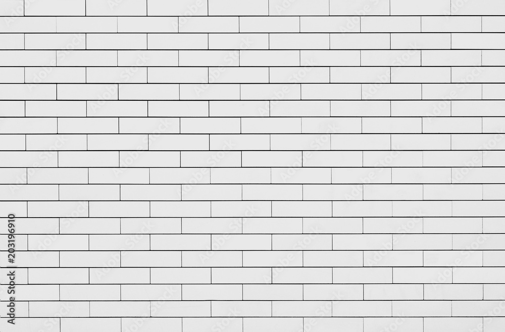 Fine texture of wall bricks. Background. Black and white image. Fine texture of wall bricks. Background. Black and white image.