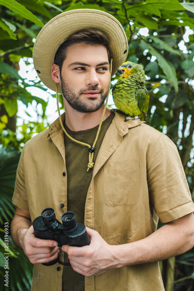 handsome young man in safari suit 