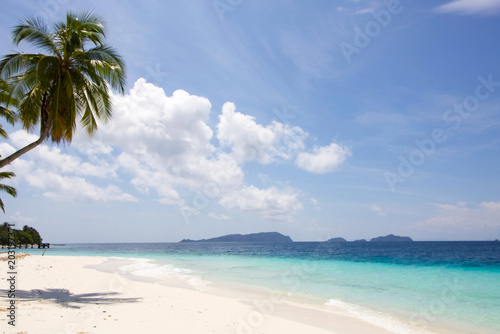 exotic seascape and beautiful beach of white sand in raja ampat archipelago