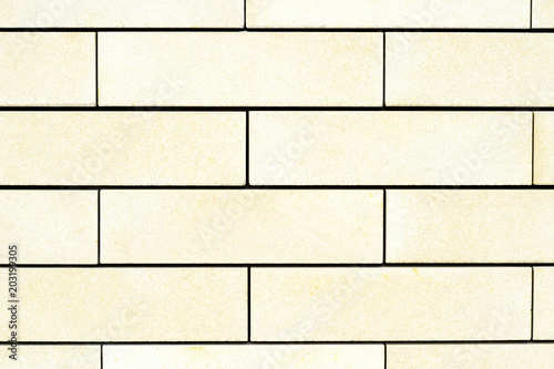Natural texture of a large light yellow brick.Background.