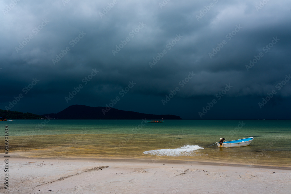 Rainy season at Koh Rong Samloem Island. Dark clouds gathering at the horizon. Saracen Bay, Cambodia. Rainy season at Koh Rong Samloem Island. Dark clouds gathering at the horizon. Saracen Bay, Cambodia.
