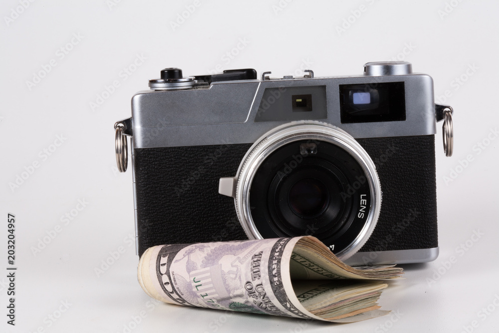 Camera with a dollar, model on dollar banknote