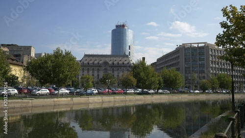 Dambovita river and the BCR Bank headquarters  photo