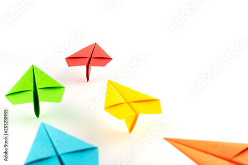 Paper plane on white background. Business competition concept.