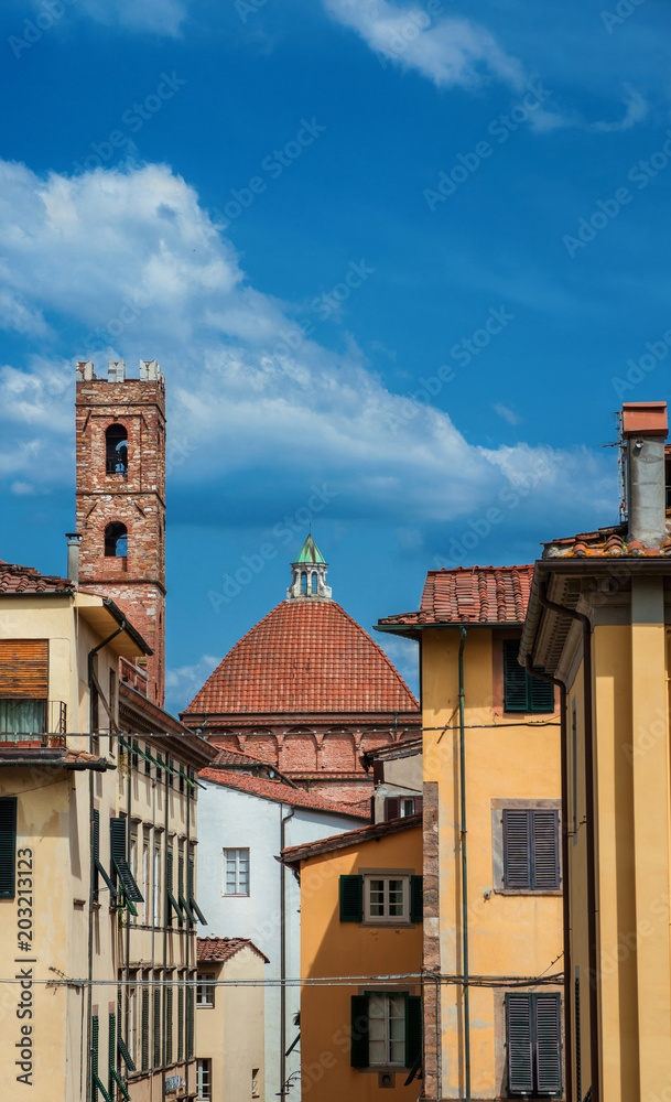 Lucca historic center with the medieval church of Church of Saints John and Reparata dome and bell tower