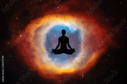 Yoga at night. Vector conceptual illustration with silhouette of yoga girl in lotus pose. Abstract background with Helix Nebula