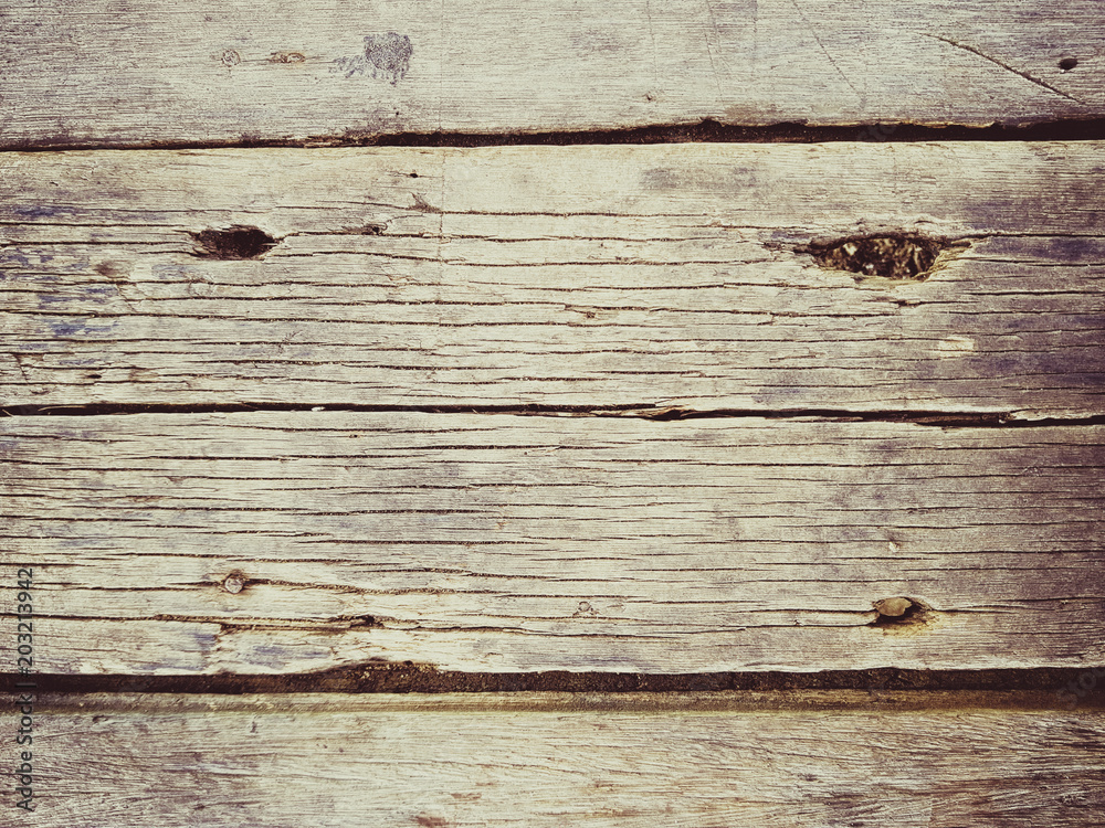 rustic weathered barn wood background with knots and nail holes rustic weathered barn wood background with knots and nail holes