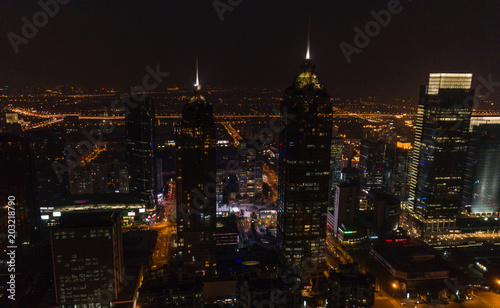 Night panoramic aerial view of skyscrapers