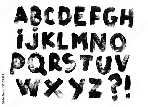 Alphabet set of black capital handwritten letters on a white background. Drawn by semi-dry brush with unpainted areas.
