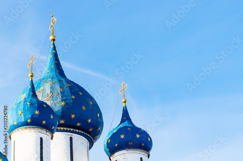 tops of Cathedral of the Nativity in Suzdal town photo