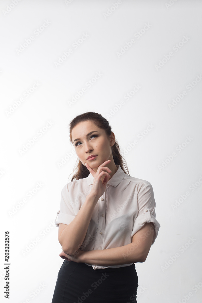 young business girl smiling in white shirt and black skirt on white isolated background young business girl smiling in white shirt and black skirt on white isolated background