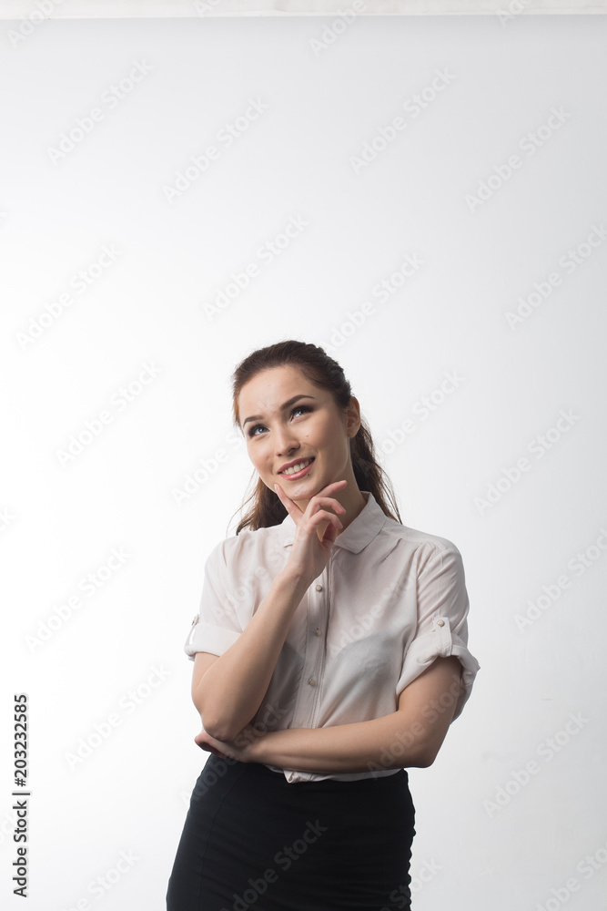 young business girl smiling in white shirt and black skirt on white isolated background young business girl smiling in white shirt and black skirt on white isolated background