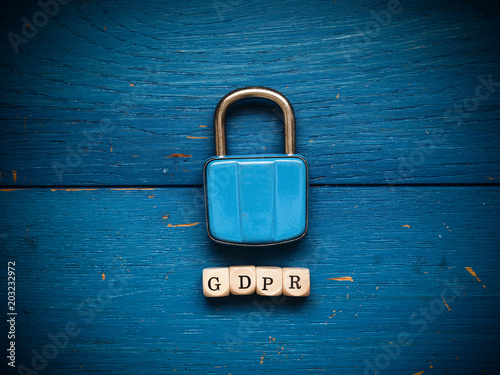 GDPR concept image on rustic blue wood photo