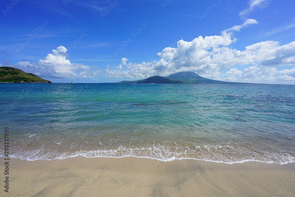 View of the Nevis Peak volcano across the water from St Kitts