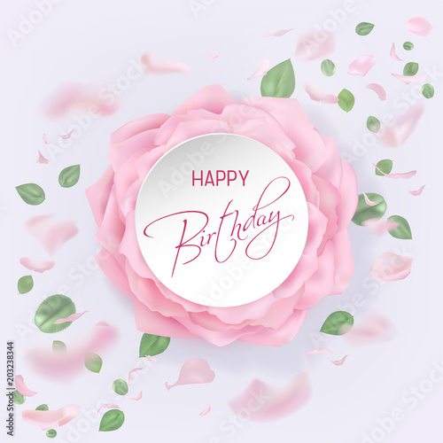 Happy birthday card with red rose petals