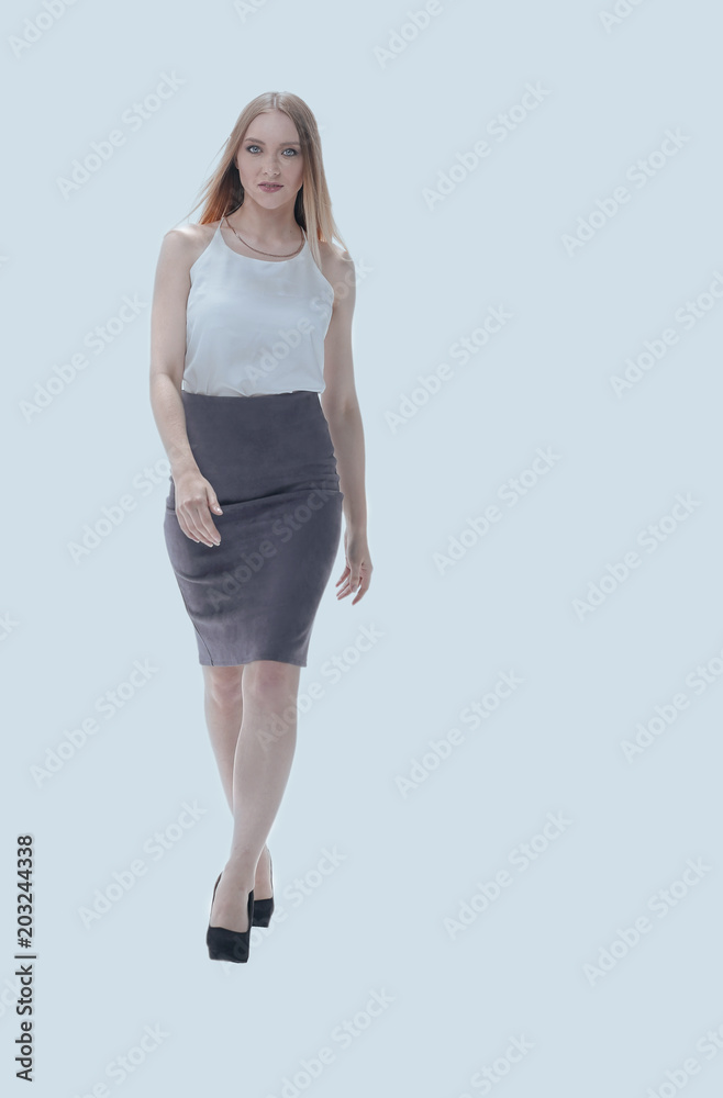 Fototapeta premium successful business woman goes ahead .. full-length photo
