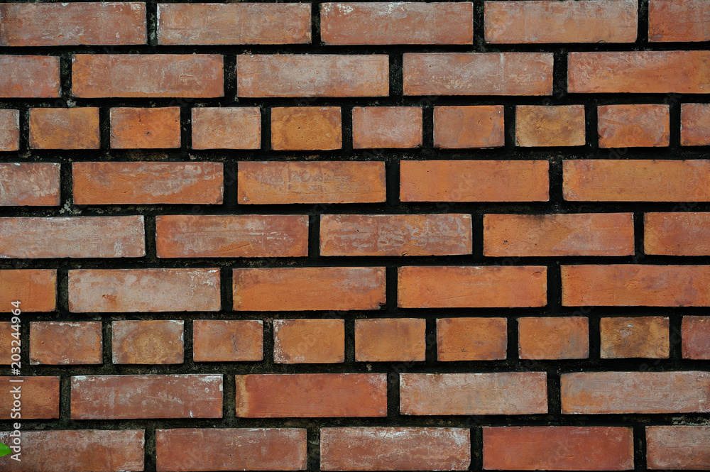 Fototapeta premium old red brick wall, red brick wall with old black cement