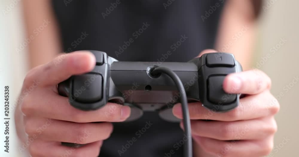 Woman playing game on console Woman playing game on console