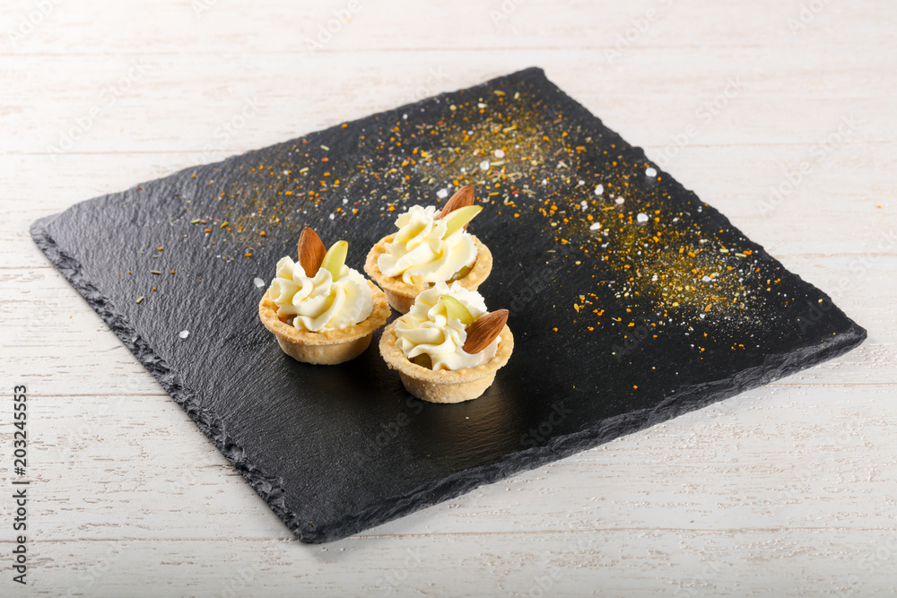 Fototapeta premium Tartlet with cheese cream