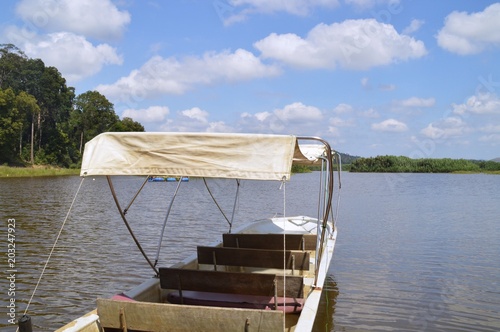 the boat is waiting at Tasik Chini, Malaysia