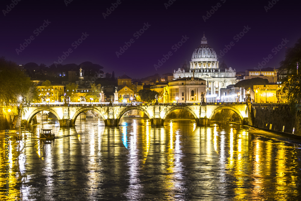 VATICAN CITY SAINT PETER BASILICA BY RIVER. NIGHT LIGHT. FAMOUS DESTINATION OF ROME. TOP ATTRECTION OF ITALY.