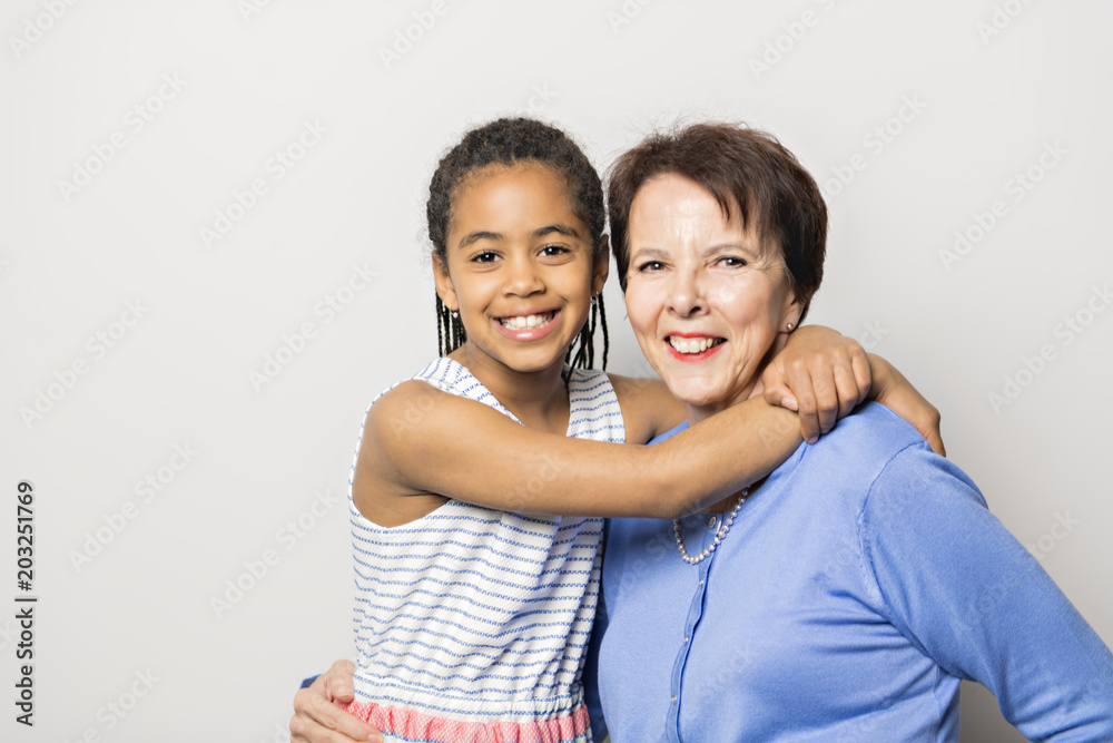 black girl child with grandmother in studio white background black girl child with grandmother in studio white background