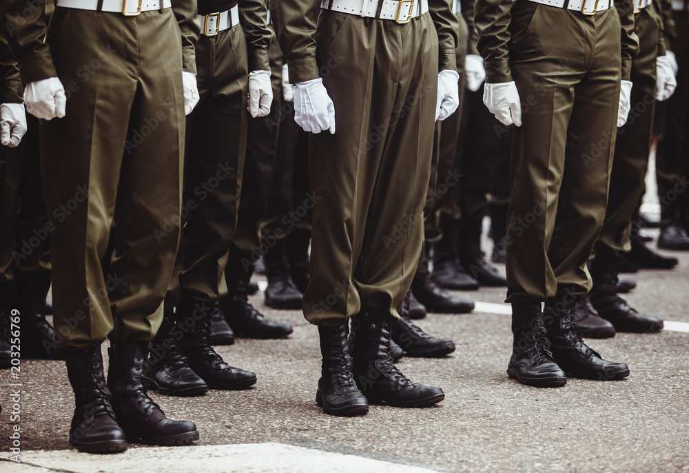 military men in green dress uniform stand at attention military men in green dress uniform stand at attention