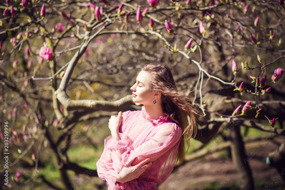 girl posing in magnolia garden girl posing in magnolia garden