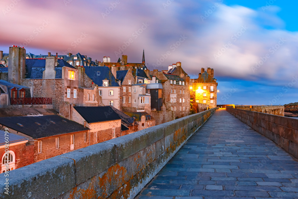 Night view of beautiful walled city Intra-Muros in Saint-Malo, also known as city corsaire, Brittany, France