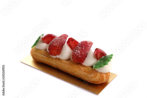 Choux cream with strawberry isolated in white background