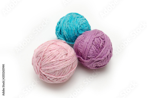 Colorful balls of yarn isolated on white