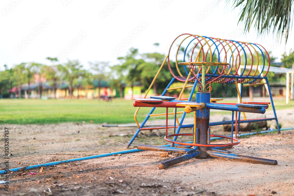 old children playground with soft-focus and over light in the background old children playground with soft-focus and over light in the background