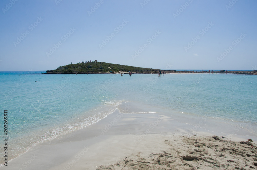 Sea and beach landscape view. Light blue water and white sand. Nissi beach, Agia Napa, Cyprus, Mediterranean Sea. Summer, travel, vacation concept. Copyplace, place for text Sea and beach landscape view. Light blue water and white sand. Nissi beach, Agia Napa, Cyprus, Mediterranean Sea. Summer, travel, vacation concept. Copyplace, place for text