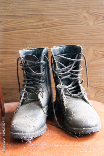 old boots in military style