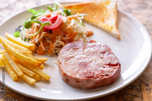 Ham steak and vegetable salad