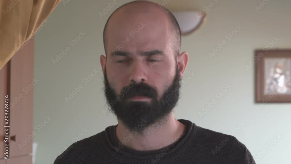Beardy Man Reflecting with Funny Faces Beardy Man Reflecting with Funny Faces